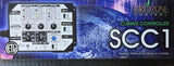 Front of a product box for the GZ Control SCC1 Climate Controller, featuring a large image of the black and white device on a blue abstract background with the model name SCC1 in large white text.