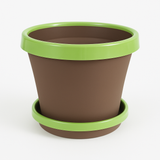 Brown planter with green rim on a white background