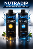 Two bottles of Nutradip calibration solution with water splashes on a reflective surface.